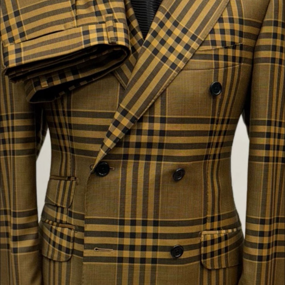 Stylish yellow gold and black plaid double-breasted suit.